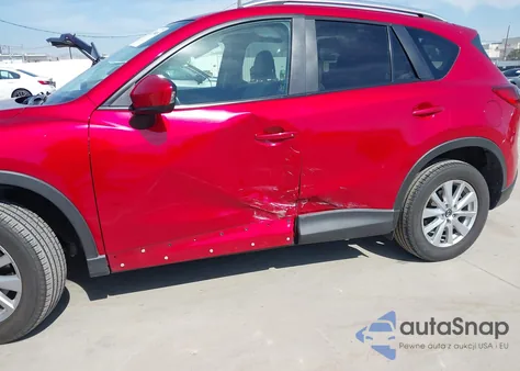 2014 Mazda Cx-5 Touring z USA, uszkodzony, nr VIN JM3KE2CY3E0415576